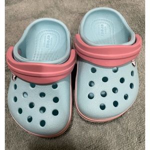 Pink and blue crocs
